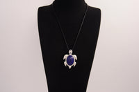 Raw Earth Crystals lapis lazuli turtle necklace crafted from natural stone to enhance wisdom, truth, and inner clarity with calming energy.