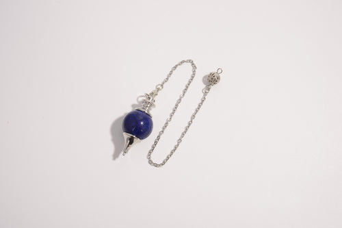 Raw Earth Crystals lapis lazuli pendulum with silver chain, crafted from natural crystal, promotes intuition, truth, and spiritual insight.