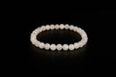 White moonstone beaded bracelet from Raw Earth Crystals, featuring natural gemstones for intuition, emotional balance, and lunar energy.