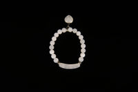 Raw Earth Crystals moonstone bracelet with raw stone accent, crafted from natural crystal, enhances intuition, emotional balance, and inner calm.