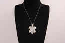 Raw Earth Crystals moonstone turtle necklace crafted from natural crystal to support intuition, emotional balance, and inner calm.