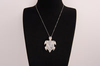 Raw Earth Crystals moonstone turtle necklace crafted from natural crystal to support intuition, emotional balance, and inner calm.