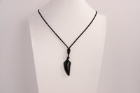 Raw Earth Crystals obsidian point pendant necklace featuring natural crystal jewelry designed for protection, grounding, and emotional healing.