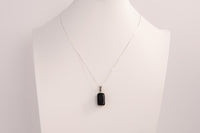Raw Earth Crystals obsidian rectangle pendant necklace featuring natural crystal jewelry designed for protection, grounding, and emotional clarity.