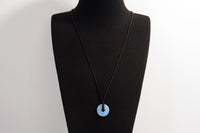Raw Earth Crystals opalite disc pendant necklace made with natural crystal for emotional healing, clarity, and spiritual connection.