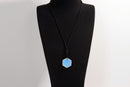 Raw Earth Crystals opalite geometric pendant necklace crafted from natural crystal for emotional healing, intuition, and inner peace.