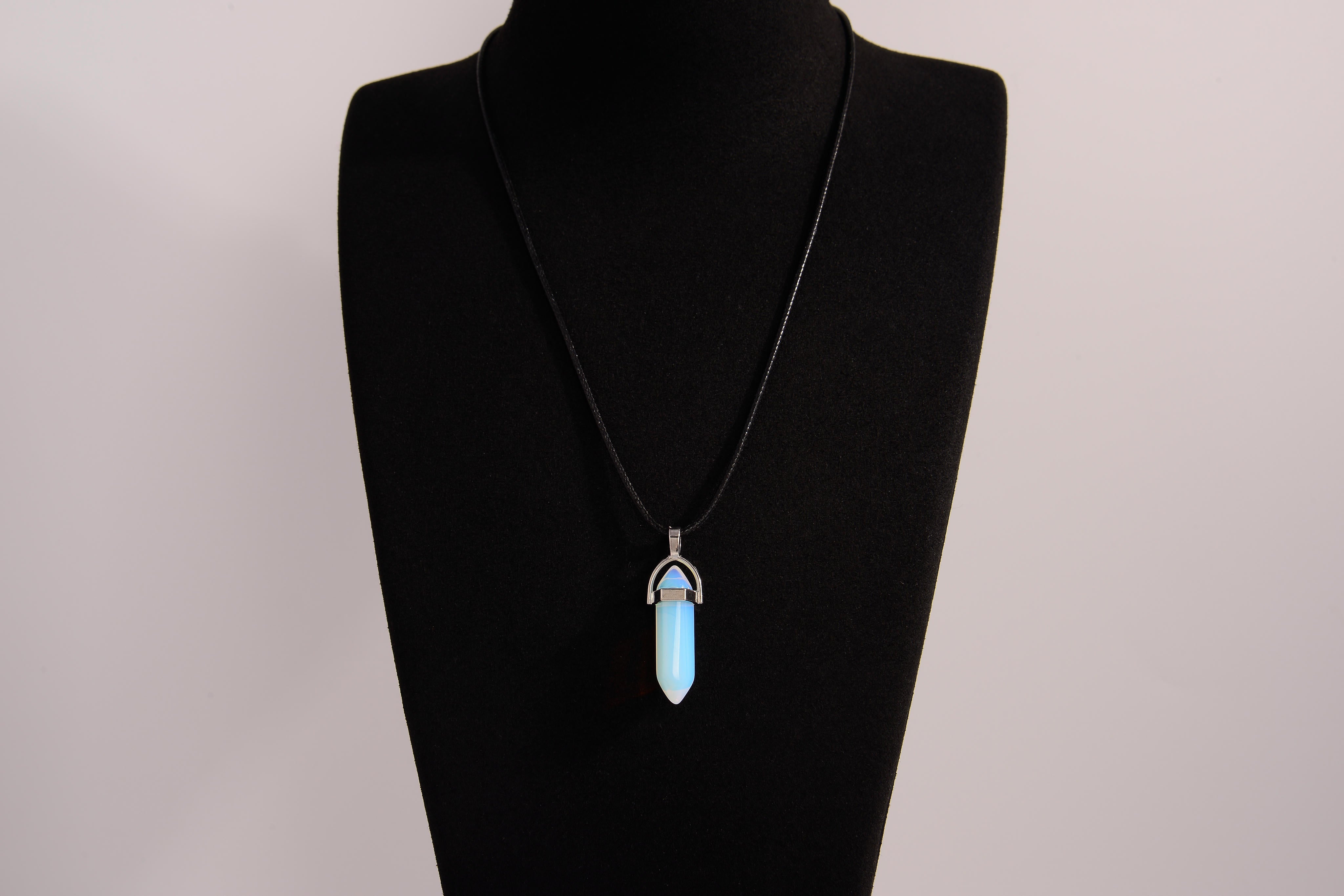 Raw Earth Crystals opalite necklace with a pointed natural stone pendant, designed to promote emotional balance, enhance clarity, and support spiritual awareness.