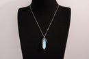Raw Earth Crystals opalite necklace featuring a pointed natural stone pendant, designed to enhance emotional balance, promote clarity, and support spiritual connection.