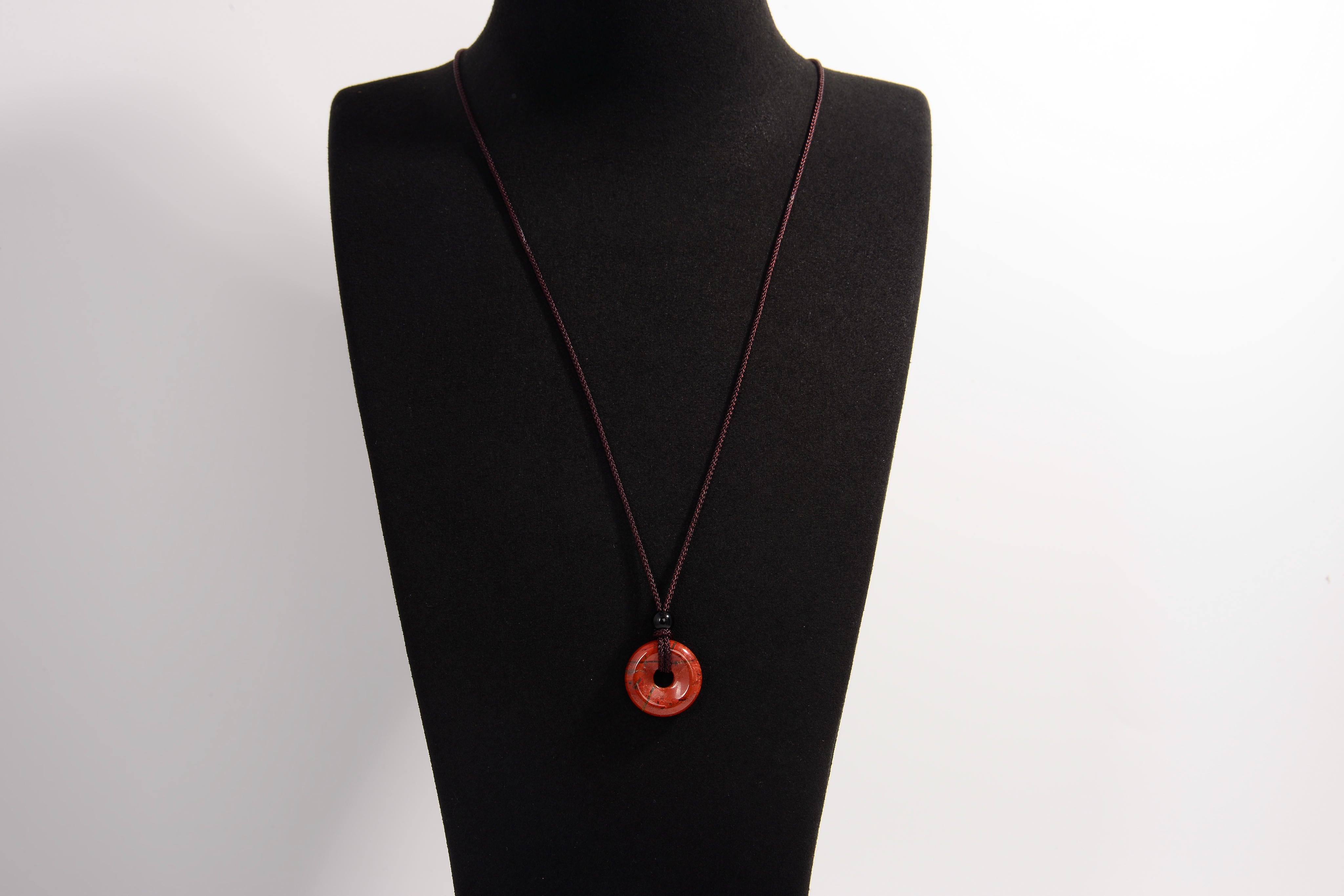 Raw Earth Crystals red jasper disc pendant necklace crafted from natural crystal for strength, grounding, and vitality.