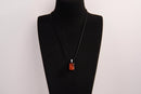 Raw Earth Crystals red jasper rectangle pendant necklace featuring natural crystal jewelry designed for grounding, strength, and emotional stability.