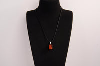 Raw Earth Crystals red jasper rectangle pendant necklace featuring natural crystal jewelry designed for grounding, strength, and emotional stability.