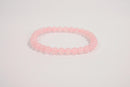 Rose quartz beaded bracelet from Raw Earth Crystals, featuring natural gemstones for love, compassion, and emotional healing.