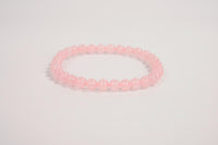 Rose quartz beaded bracelet from Raw Earth Crystals, featuring natural gemstones for love, compassion, and emotional healing.