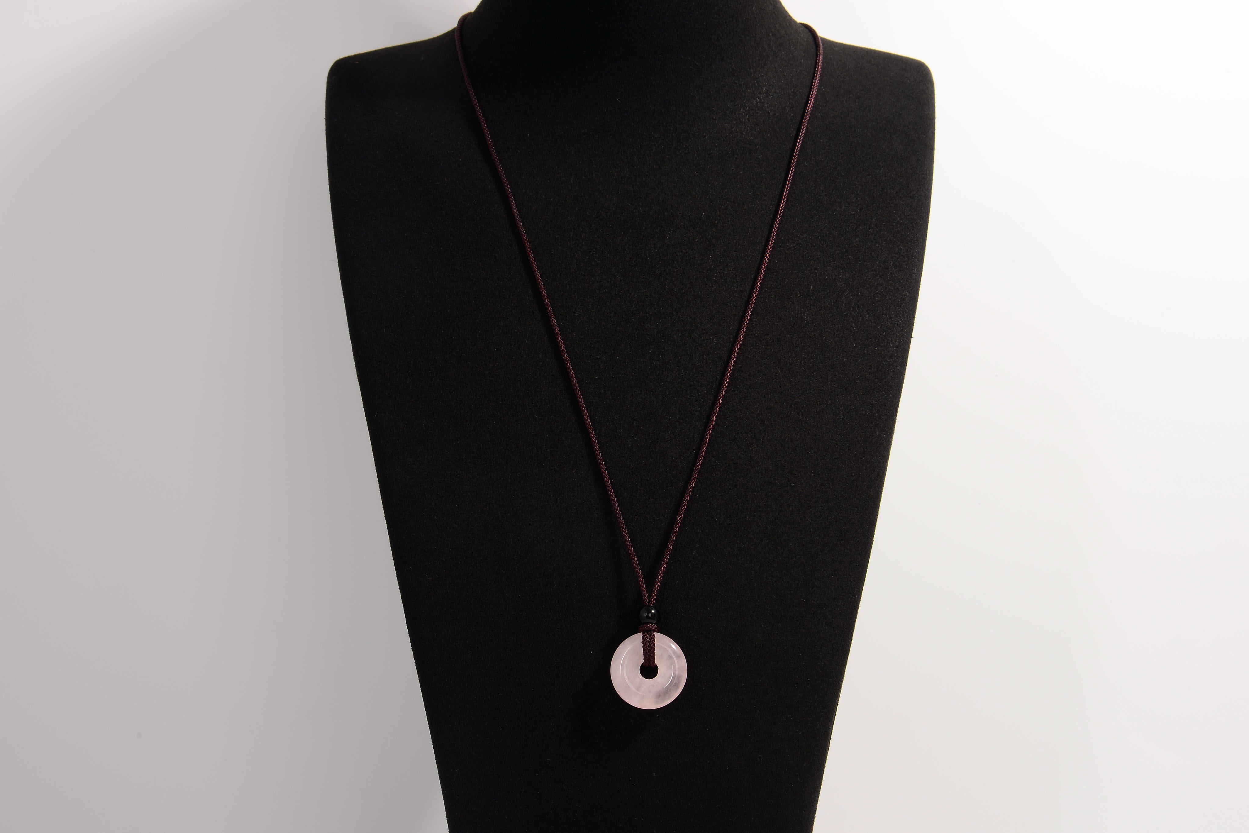 Raw Earth Crystals rose quartz disc pendant necklace crafted from natural crystal for love, compassion, and emotional healing.