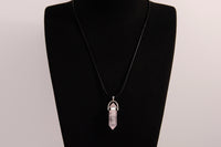 Raw Earth Crystals rose quartz necklace featuring a pointed natural stone pendant, designed to promote love, compassion, and emotional healing.