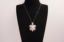 Raw Earth Crystals rose quartz turtle necklace made from natural crystal to open the heart, encourage self-love, and invite gentle emotional healing.