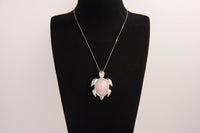 Raw Earth Crystals rose quartz turtle necklace made from natural crystal to open the heart, encourage self-love, and invite gentle emotional healing.
