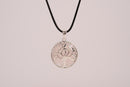 Raw Earth Crystals rose quartz pendant featuring a tree of life design, crafted with natural crystal for love, compassion, and emotional healing.