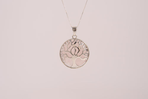 Raw Earth Crystals rose quartz pendant featuring a tree of life design, crafted with natural crystal for love, compassion, and emotional healing.