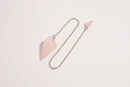 Raw Earth Crystals rose quartz pendulum with pointed crystal and silver chain, crafted for emotional balance, love, and clarity.