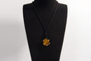 Raw Earth Crystals tiger eye geometric pendant necklace crafted from natural crystal for confidence, protection, and grounding energy.