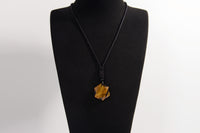 Raw Earth Crystals tiger eye geometric pendant necklace crafted from natural crystal for confidence, protection, and grounding energy.