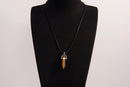 Raw Earth Crystals tiger eye necklace with a pointed natural stone pendant, designed to boost confidence, provide protection, and enhance mental clarity.