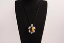 Raw Earth Crystals tiger eye turtle necklace crafted from natural stone to boost courage, focus, and personal power with grounding energy.