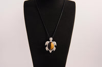 Raw Earth Crystals tiger eye turtle necklace crafted from natural stone to boost courage, focus, and personal power with grounding energy.
