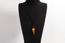 Raw Earth Crystals tiger eye point pendant necklace featuring natural crystal jewelry designed for confidence, focus, and personal power.