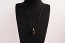 Raw Earth Crystals tiger eye rectangle pendant necklace featuring natural crystal jewelry designed for confidence, focus, and personal power.