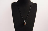 Raw Earth Crystals tiger eye rectangle pendant necklace featuring natural crystal jewelry designed for confidence, focus, and personal power.