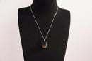 Raw Earth Crystals tiger eye rectangle pendant necklace featuring natural crystal jewelry designed for confidence, focus, and personal power.