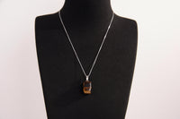 Raw Earth Crystals tiger eye rectangle pendant necklace featuring natural crystal jewelry designed for confidence, focus, and personal power.
