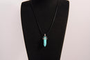 Raw Earth Crystals turquoise necklace featuring a pointed natural stone pendant, designed to promote communication, enhance intuition, and support emotional healing.