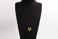 Raw Earth Crystals unakite donut pendant necklace, made from natural unakite to encourage emotional balance, compassion, and spiritual growth.