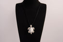 Raw Earth Crystals white turquoise turtle necklace crafted from natural stone to encourage calmness, clarity, and emotional healing.