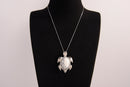 Raw Earth Crystals white turquoise turtle necklace crafted from natural stone to encourage calmness, clarity, and emotional healing.